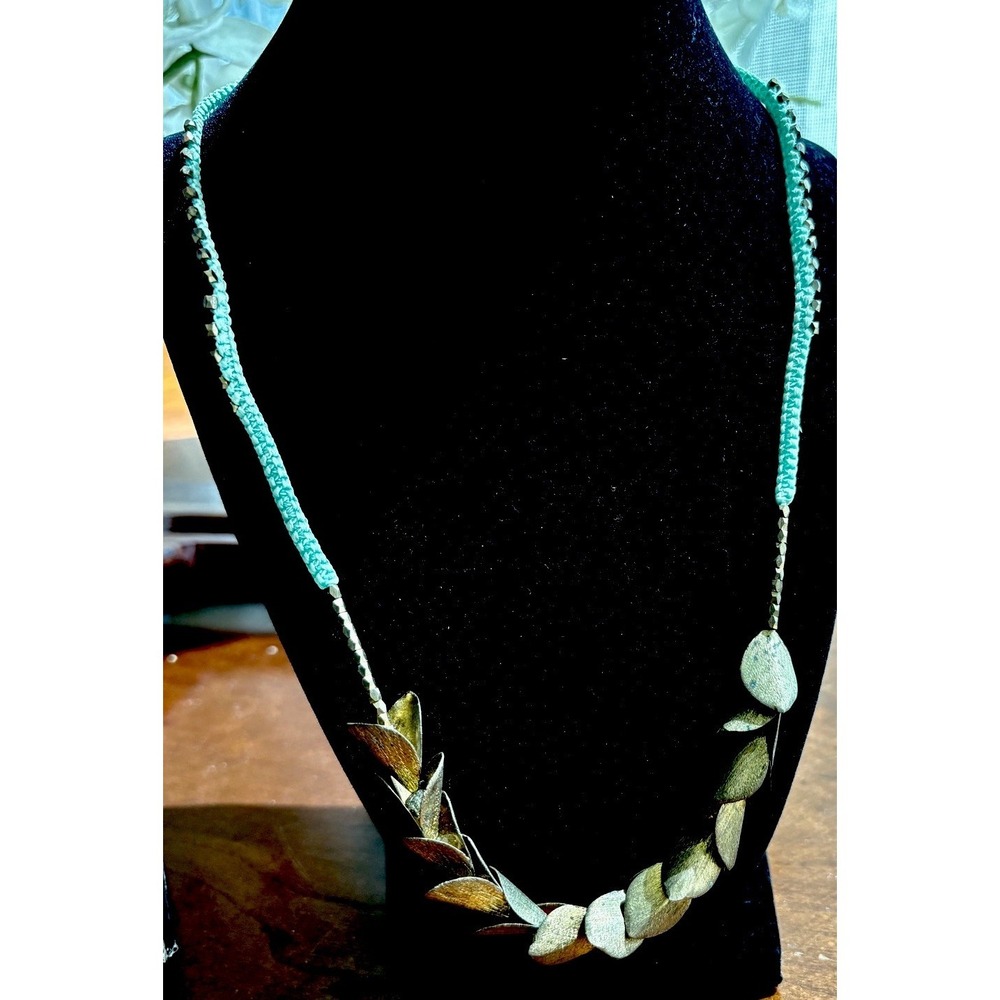 Serefina Textured Brass Conjoined Leaves Bib Necklace Boho Woven Cord